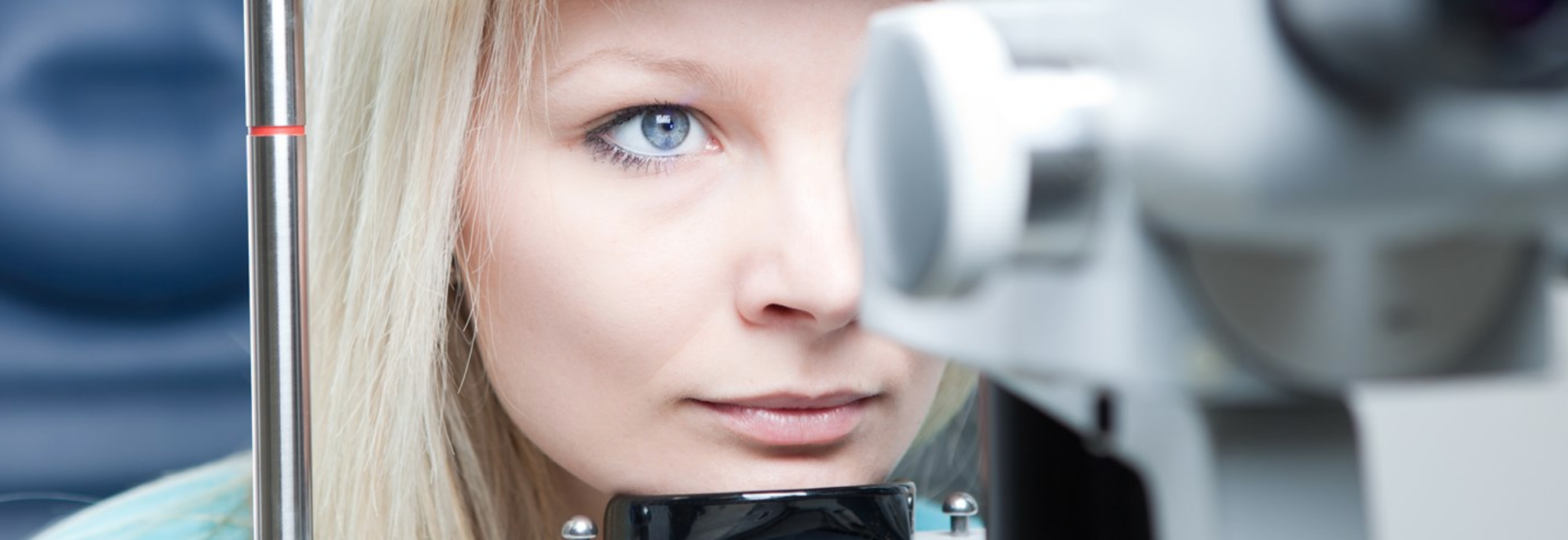 Woman taking a refractory eye exam
